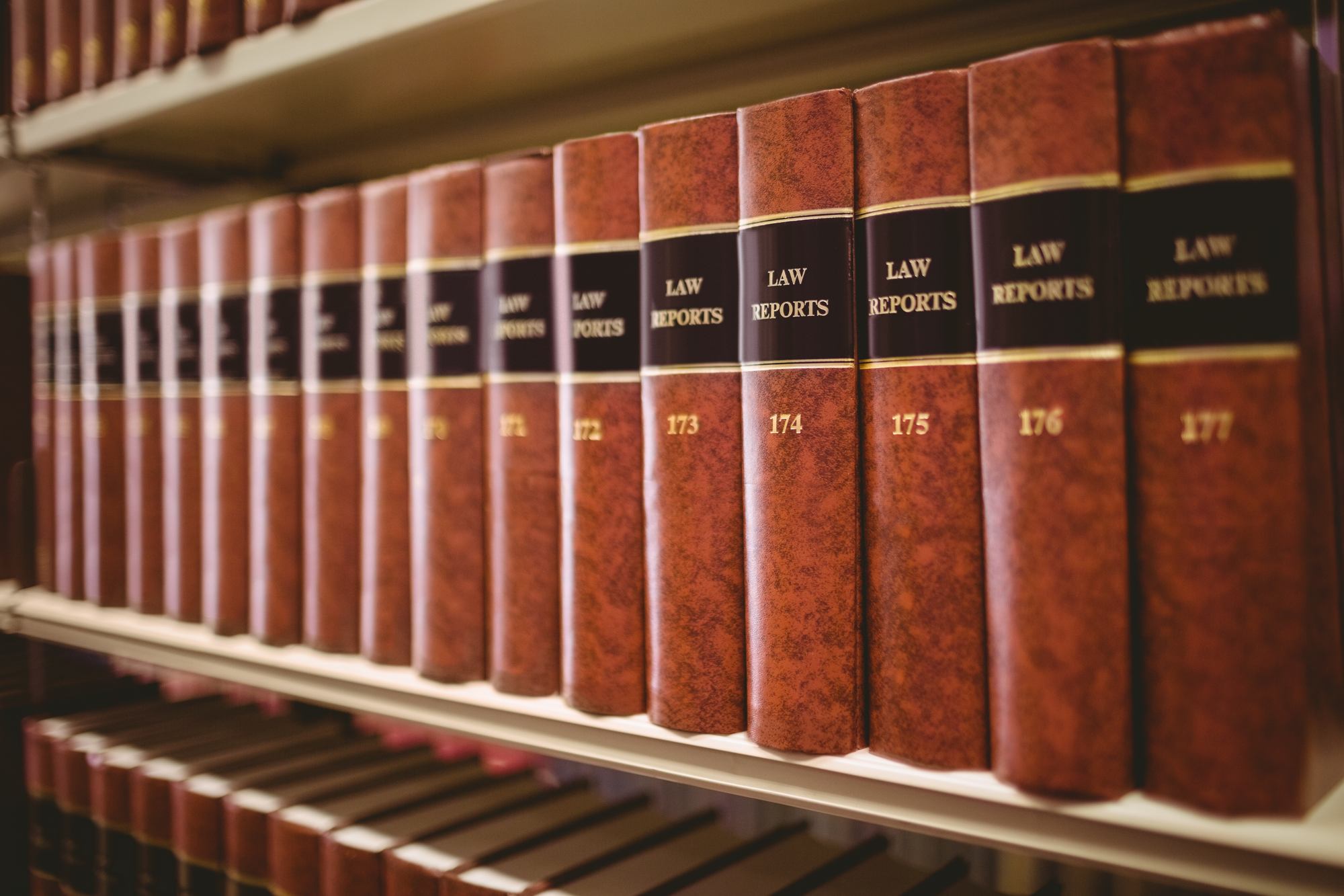 Legal volumes on a library shelf
