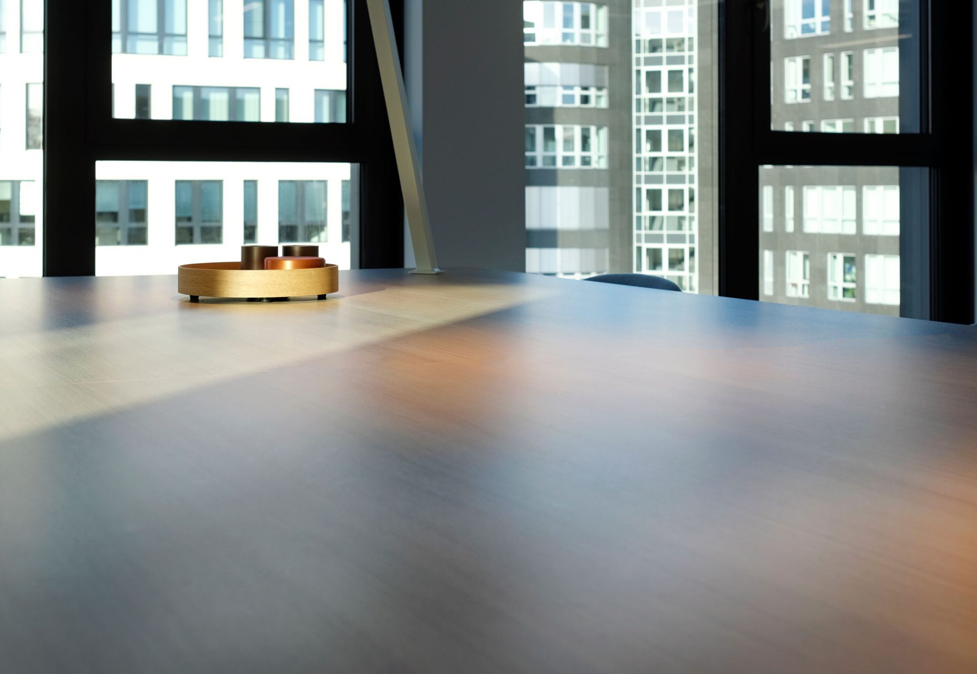 An empty boardroom meeting table